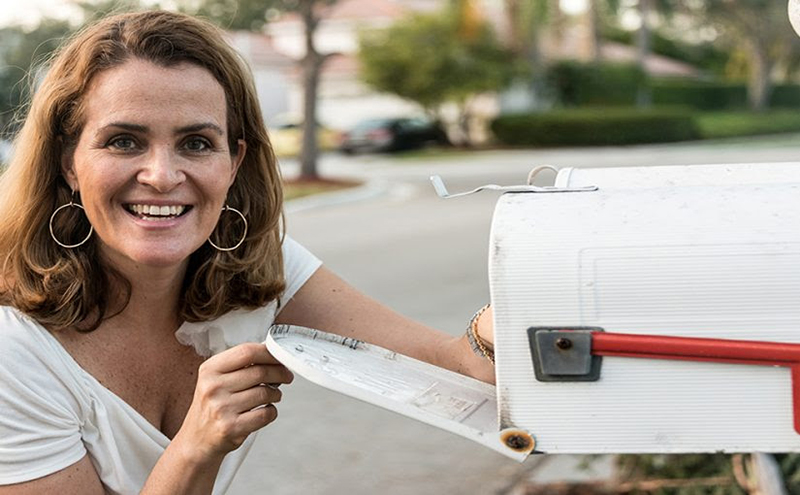 Lady at mailbox